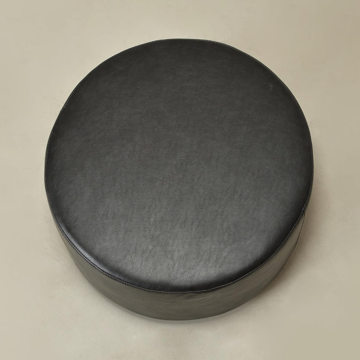 KINWELL Modern Faux Leather Round Upholstered Ottoman, Multi-Functional Sofa Footrest, Side Table, Extra Seating for Living Room, Bedroom (Black, 24" D x 24" W x 13" H)