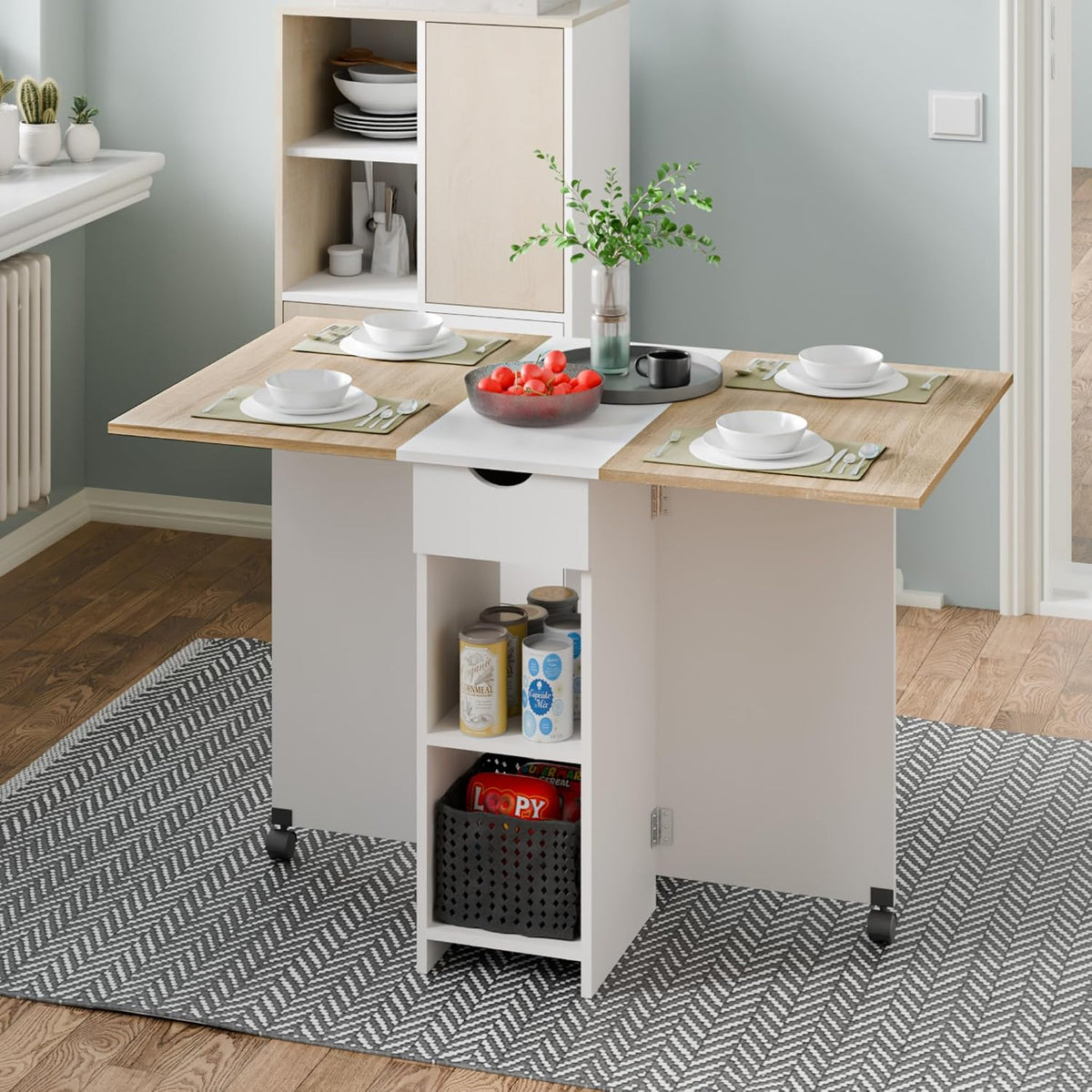 Mondeer Folding Dining Table with Drawer and Shelves, Oak & White | Drop Leaf Kitchen Table with 1 Drawer and 2 Storage Shelves in Modern Style for Small Spaces and Seats 4-6 People.